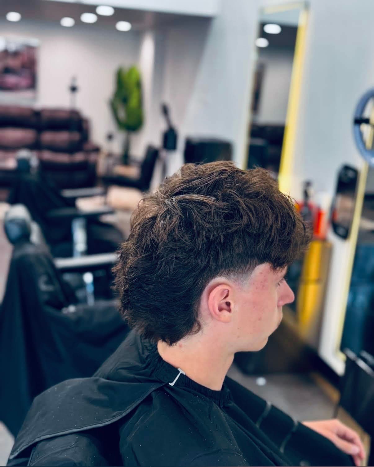 Close-up of a fade haircut in progress at Glasscut Barbershop