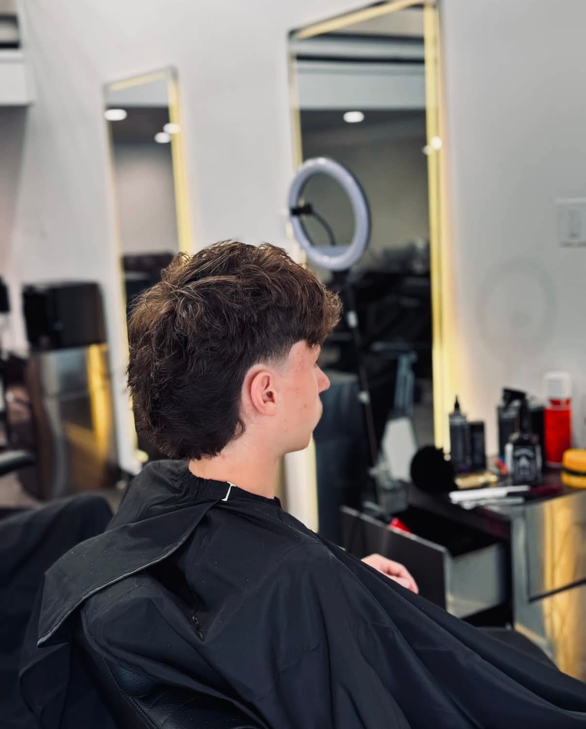 Styling station detail at Glasscut Barbershop