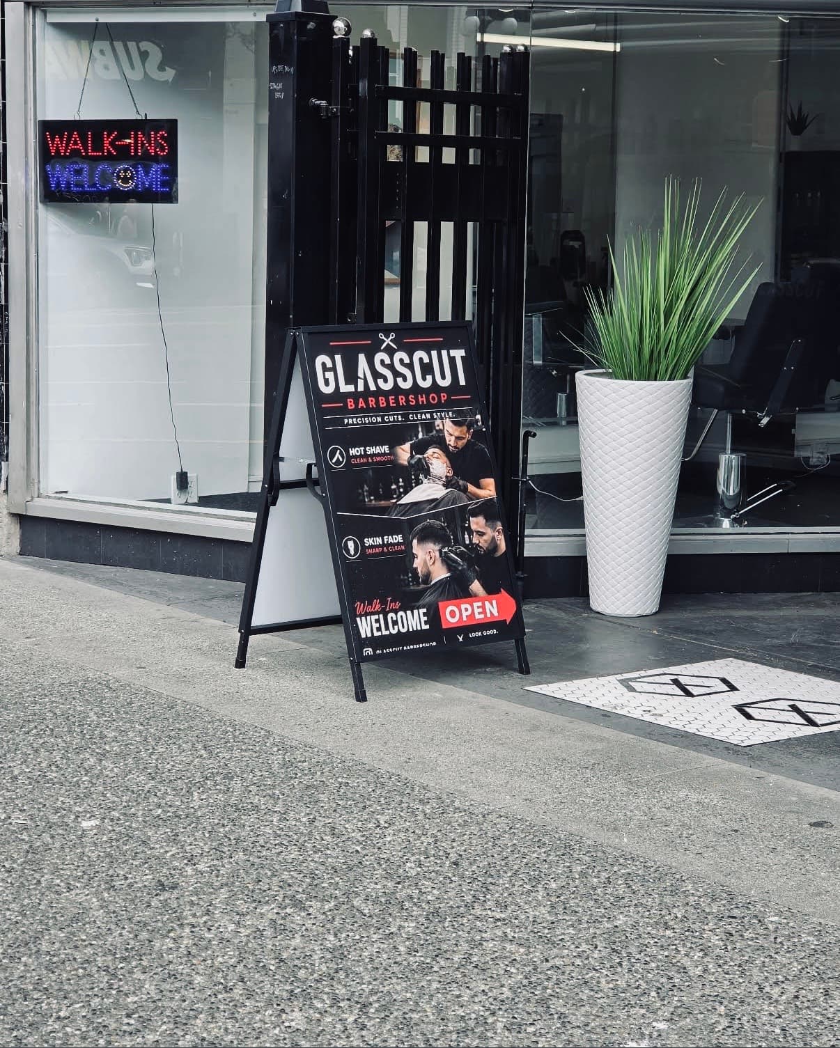 Glasscut Barbershop sidewalk sign — Walk-ins Welcome