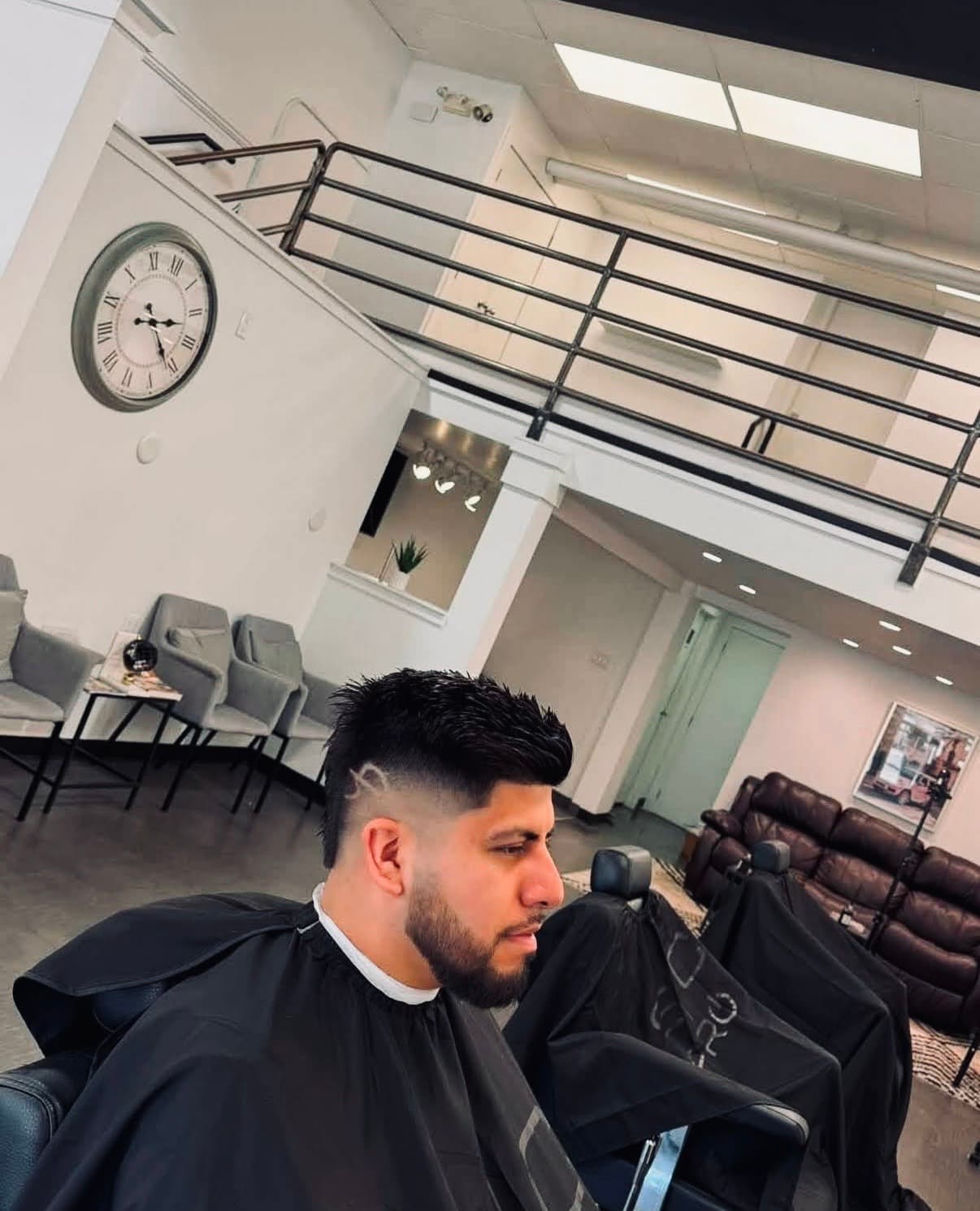Glasscut Barbershop waiting lounge and upstairs mezzanine